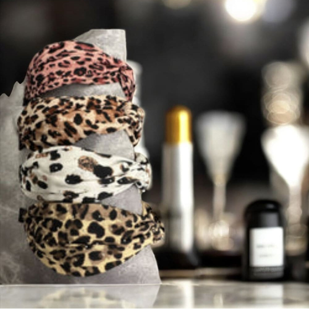 Hiuspanta leopardi kivillä | Hiuspannat